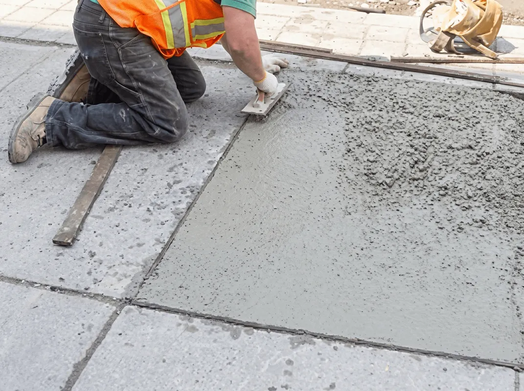 Professional repairing a concrete floor in Myrtle Beach, SC